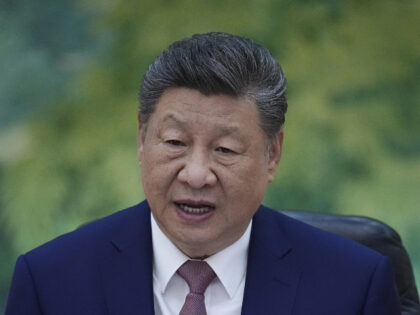Chinese President Xi Jinping speaks during a meeting with Russian Foreign Minister Sergey