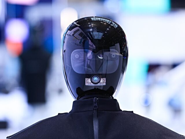 An HMND 01 Alpha humanoid robot at the Siemens AG booth at the Hannover Messe 2026 trade f