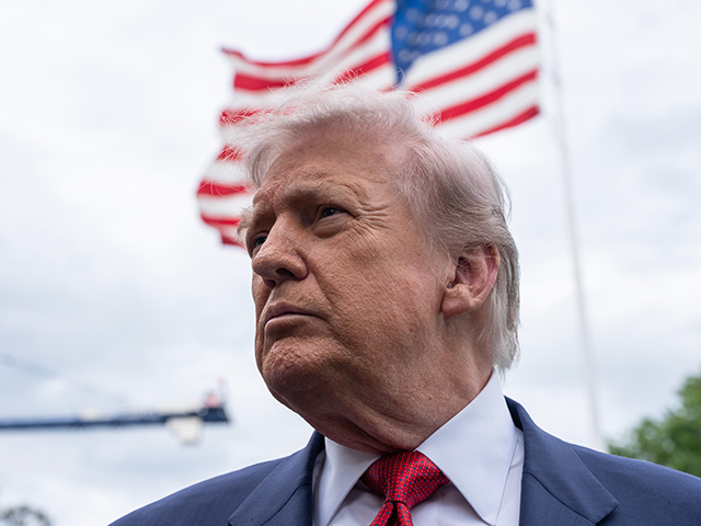 President Donald Trump speaks to press on the South Lawn of the White House before boardin