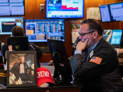 Traders work on the floor of the New York Stock Exchange on April 14, 2025, in New York Ci