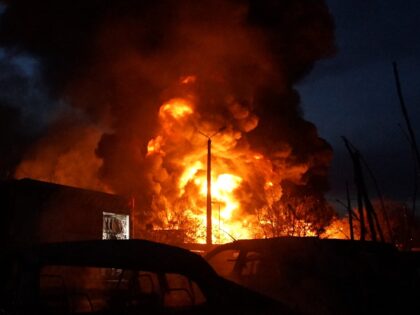 KYIV, UKRAINE - APRIL 16: Smoke and flames rise into the sky after a Russian combined stri
