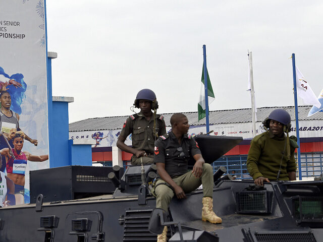 Anti-riot policemen guard during the opening of the 21st African Senior Athletics Champion