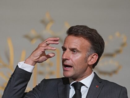 France's President Emmanuel Macron gestures as he delivers a speech during a ceremony mark