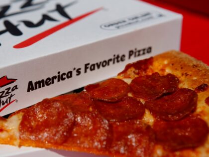 A pepperoni pizza from a Pizza Hut restaurant, a unit of Yum! Brands Inc., is arranged for