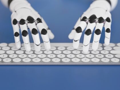 robot typing a book