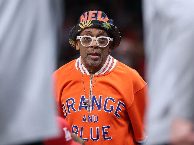ATLANTA, GEORGIA - APRIL 25: Director Spike Lee reacts during the fourth quarter of game f