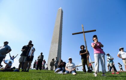 Christian worshippers gather in the shadow of the Washington Monument for a weekend '