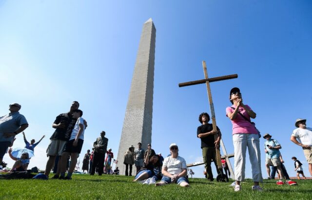 Christian worshippers gather in the shadow of the Washington Monument for a weekend '