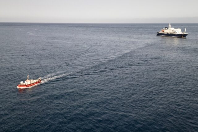 Two crew members and one other person thought to be infected were taken off the ship