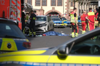Members of the emergency services work at the scene where several people were injured duri
