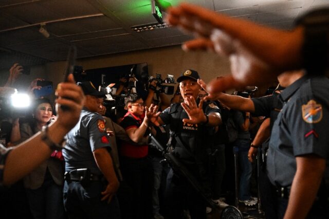 Philippine officials say it is not clear who fired shots inside the Senate