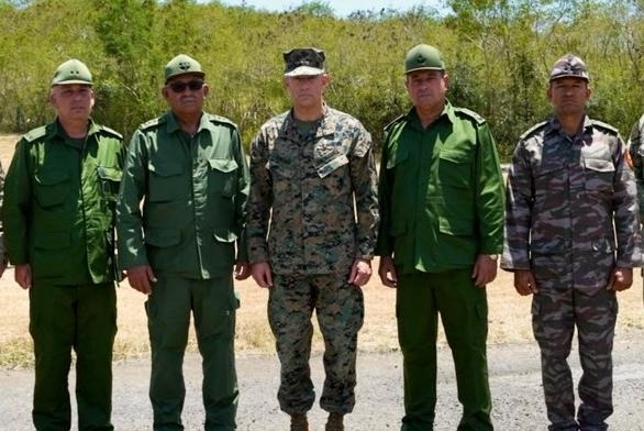 This photo shared by US Southern Command shows US Commander General Francis L. Donovan (C)