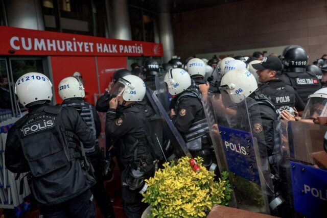 Riot police forced their way into the CHP party building