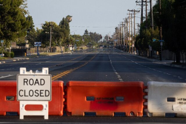 Roads remained closed after a chemical leak from a large storage tank threatened nearby ho