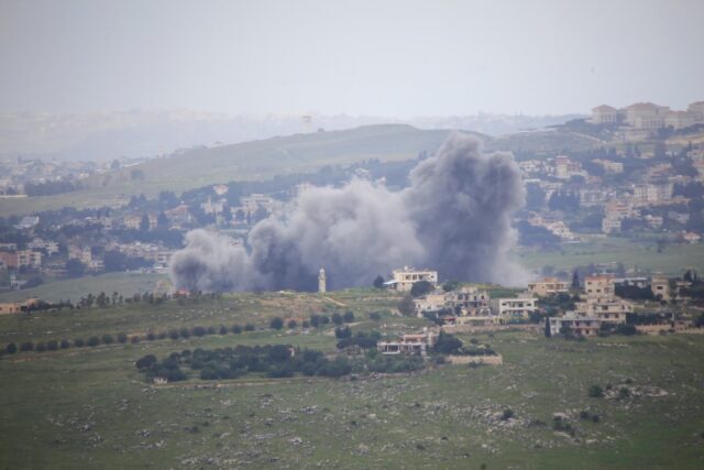 Smoke rises from an Israeli airstrike on the southern Lebanese village of Kfar Tibnit on M