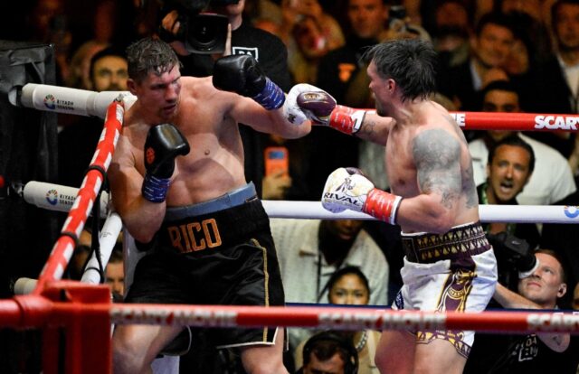 Ukraine's Oleksandr Usyk (right) throws a flurry of punches at Netherlands' Rico