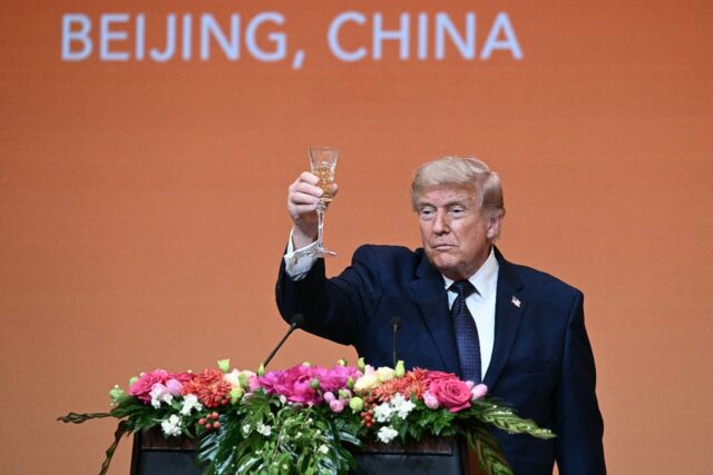 US President Donald Trump, making a toast at a state banquet with China's President X