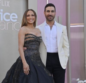 Jennifer Lopez, Brett Goldstein step out at 'Office Romance' premiere