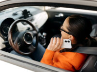 WATCH: One-Handed Florida Woman Accused of Holding Cellphone While Driving
