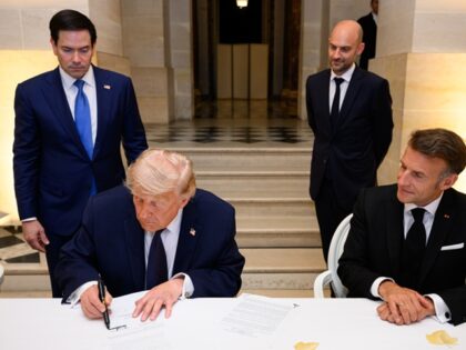 President Donald J. Trump signs a Memorandum of Understanding between the Islamic Republic