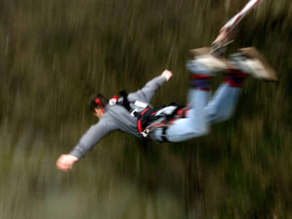 A bungee jumper leaps off a bridge over Yantra river in the town of Veliko Tarnovo, east o