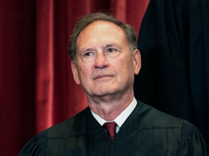 FILE - Associate Justice Samuel Alito sits during a group photo at the Supreme Court in Wa