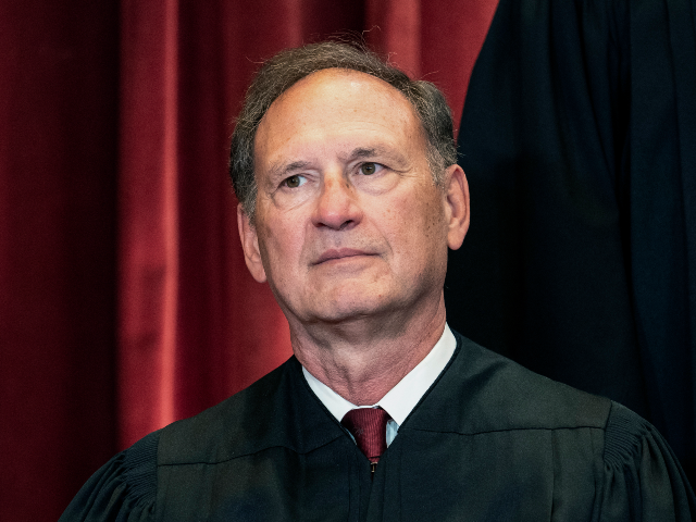 FILE - Associate Justice Samuel Alito sits during a group photo at the Supreme Court in Wa