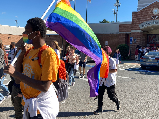 AP23199799531561 FILE - Students walk out of classes at McLean High School in McLean, Va., Sept. 27, 2022,