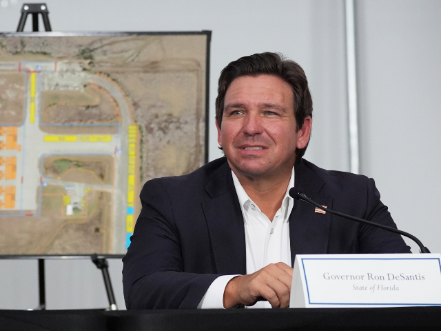 FILE - Gov. Ron DeSantis, R-Fla., listens during a roundtable at "Alligator Alcatraz,