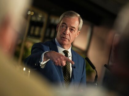Reform Party leader Nigel Farage gestures while speaking at the launch of a Save the Pub c