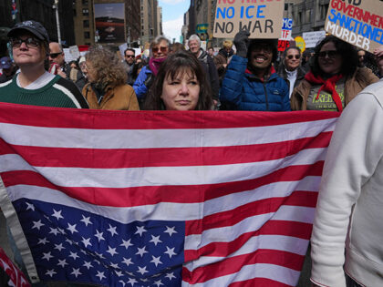 Title: No Kings Protests Image ID: 26087673518011 Article: People take part in a "No