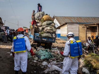 Title: Congo Ebola Image ID: 26143510416227 Article: Sanitation workers from Bunia city go