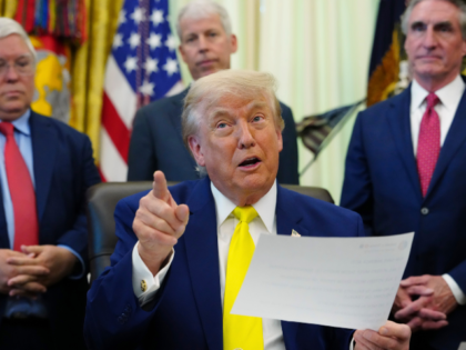 President Donald Trump speaks as West Virginia Gov. Patrick Morrisey, from left, Energy Se