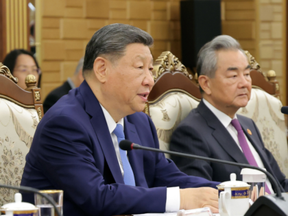 In this photo provided by the North Korean government, Chinese President Xi Jinping speaks