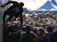 Police Battle Migrant Protesters at South African Deportation Facility