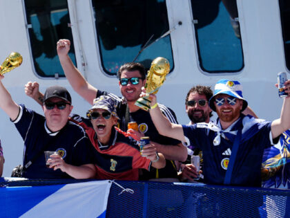 VIDEO: Boston Cop Wows Kilt-Wearing Scottish World Cup Fans with Viral Soccer Ball Juggling Display