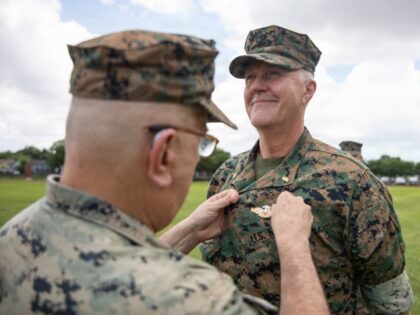 Lt. Cmdr David Westerberg receives the Fleet Marine Force insignia during a pinning ceremo