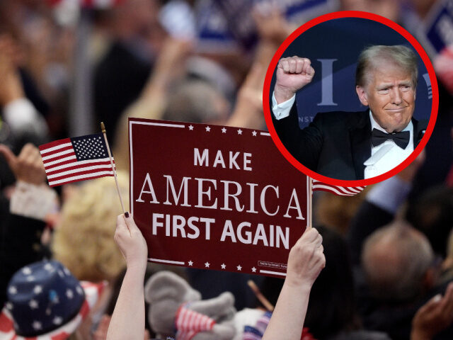 A Delegate Holds Up Signs That Read "Make America First Again" During The Openin