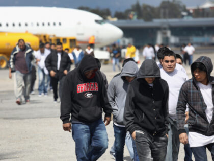 Guatemalan immigrants deported from the United States arrive on a ICE deportation flight o