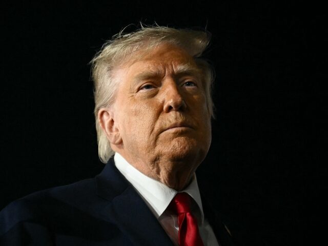 US President Donald Trump speaks to the press before boarding Air Force One prior to depar