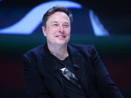 Elon Musk smiling before SpaceX IPO