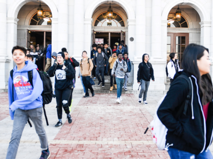 DENVER, CO - FEBRUARY 11: East High School students walk out of school shortly after class