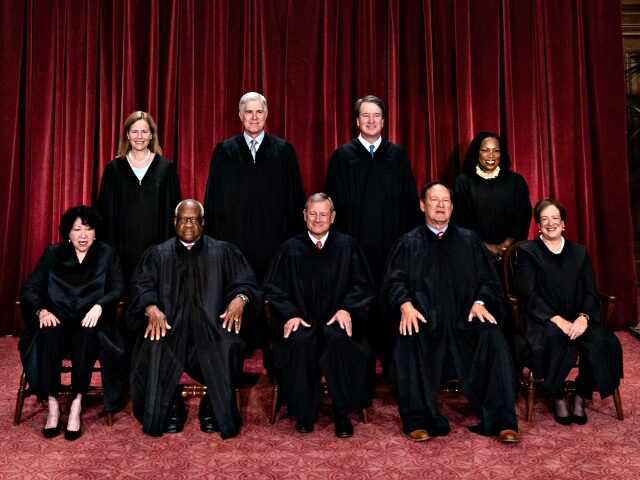Justices of the US Supreme Court during a formal group photograph at the Supreme Court in