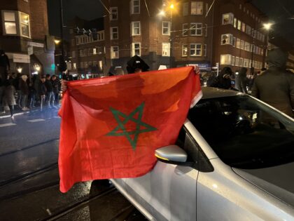 AMSTERDAM, NETHERLANDS - DECEMBER 06: Moroccan supporters celebrate victory as Morocco qua