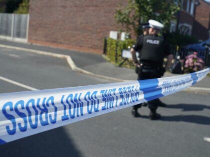 A police cordon on Old School Close in the village of Banks, Lancashire, where 17-year-old