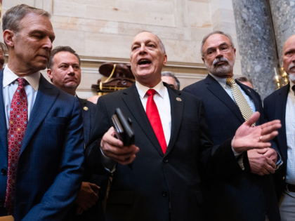 UNITED STATES - MARCH 27: From left, Reps. Scott Perry, R-Pa., Andy Biggs, R-Ariz., Andy H
