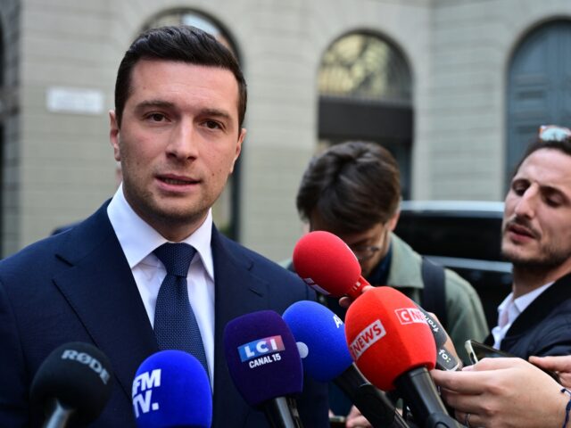 France's far-right Rassemblement National (RN) party President Jordan Bardella speaks to t
