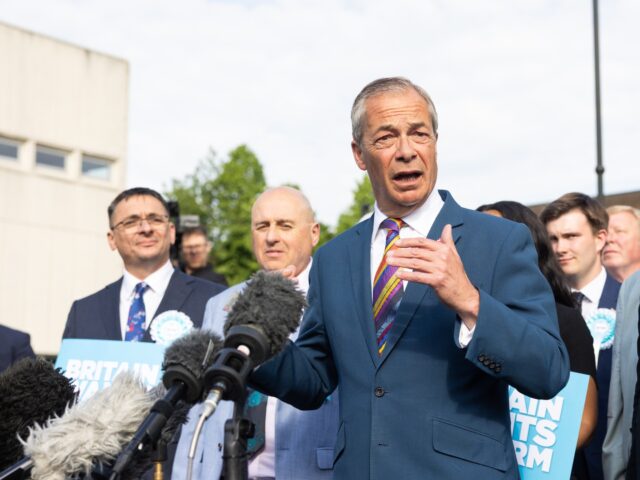 Nigel Farage, leader of Reform UK, left, and Andrew Rosindell, UK lawmaker, right, arrive