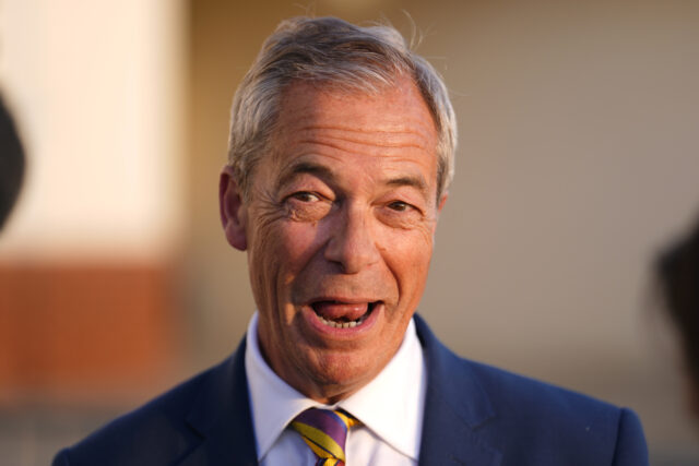 Reform UK leader Nigel Farage speaks to reporters as he arrives at a gathering for party s
