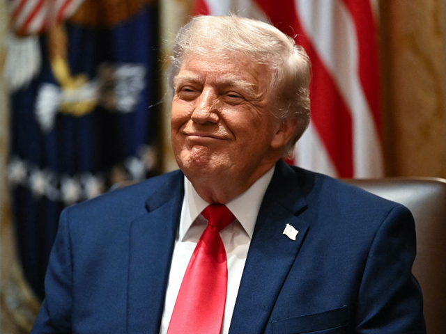 TOPSHOT - US President Donald Trump reacts during a cabinet meeting in the Cabinet Room of